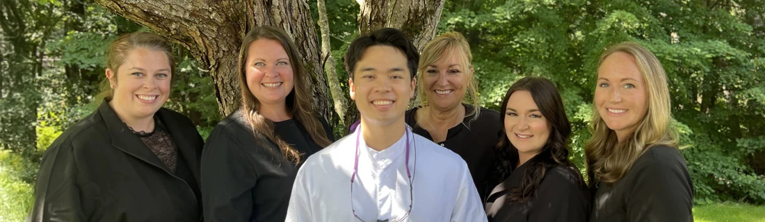 Dentist Yarmouth ME Huy Nguyen and his Team are Outside Posing for a Group Photo About Us Huy Nguyen and his Team are Outside Posing for a Group Photo About Us